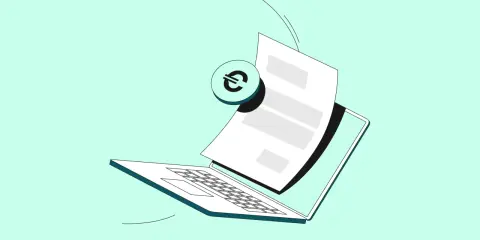 Un laptop aperto con un foglio e un simbolo dell'euro, che illustra il fattura differita significato.