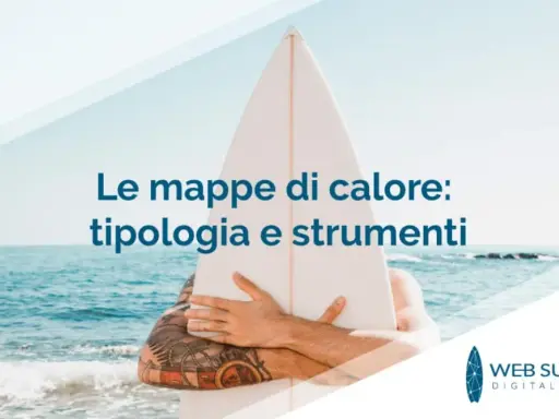 Le mappe di calore: tipologia e strumenti. Un surfista con tatuaggi abbraccia una tavola da surf sulla spiaggia.